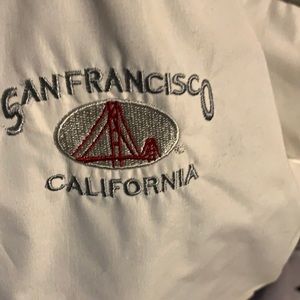 White blue no name brand coat.  Purchased while on vacation in San Francisco.